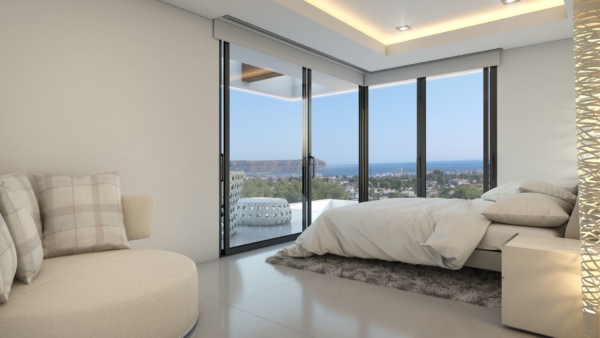 Luxury bed room in luxury homes spain with views of the sea and mountains.